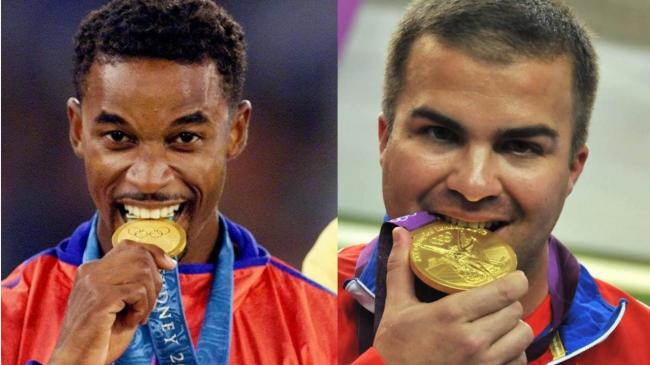 Iván Pedroso y Leuris Pupo con sus medallas de oro.